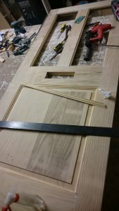 An entrance door being made